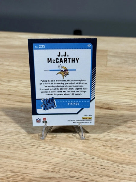 Tour Quality Golf's Shop 2024 Donruss Optic JJ McCarthy Blue Hyper Rated Rookie RC Vikings #235 J.J.