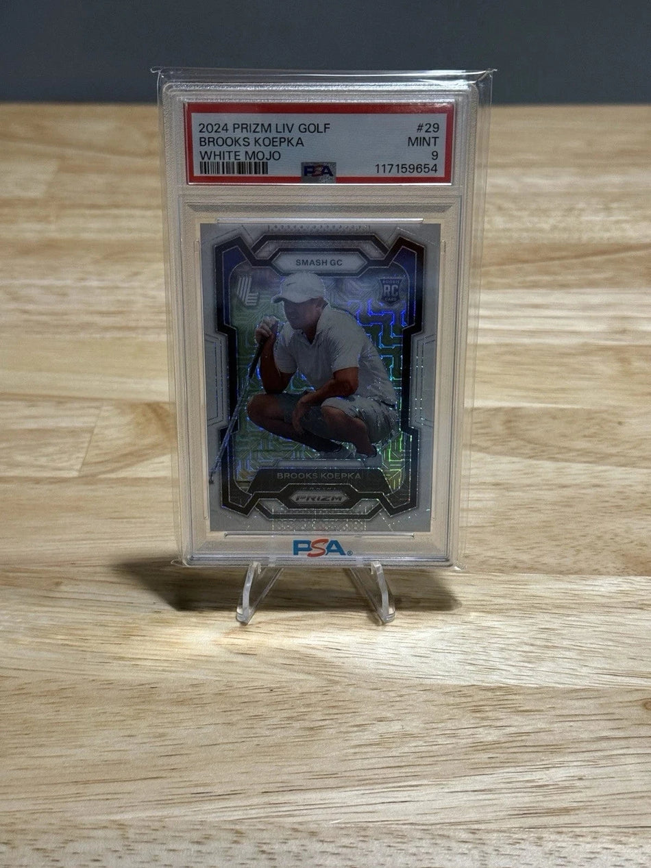 Tour Quality Golf's Shop 2024 Prizm LIV Golf Brooks Koepka RC White Mojo Rookie Card /36 PSA 9